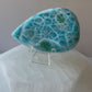 Video of Larimar palmstone crystal in a woman’s hand