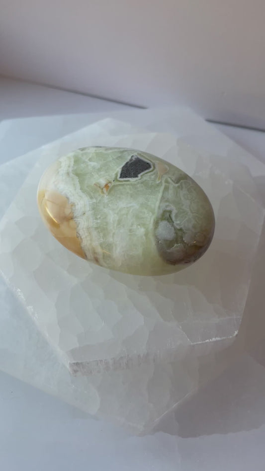 Polished Green Maligano Jasper palm stone.